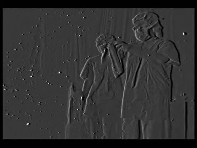 動画1　ガウンを広げる